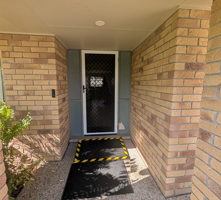 The accessible front entrance of a Birch Care Supported Independent Living home, with a ramp mat at the door